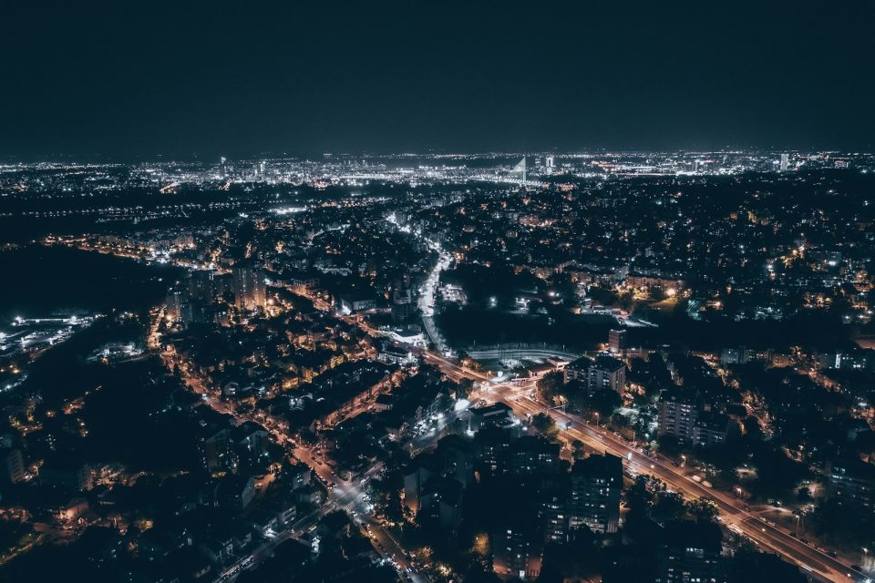 an aerial view of a city at night